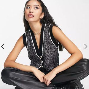 Urban Revivo knit pearl button front vest in black glitter
